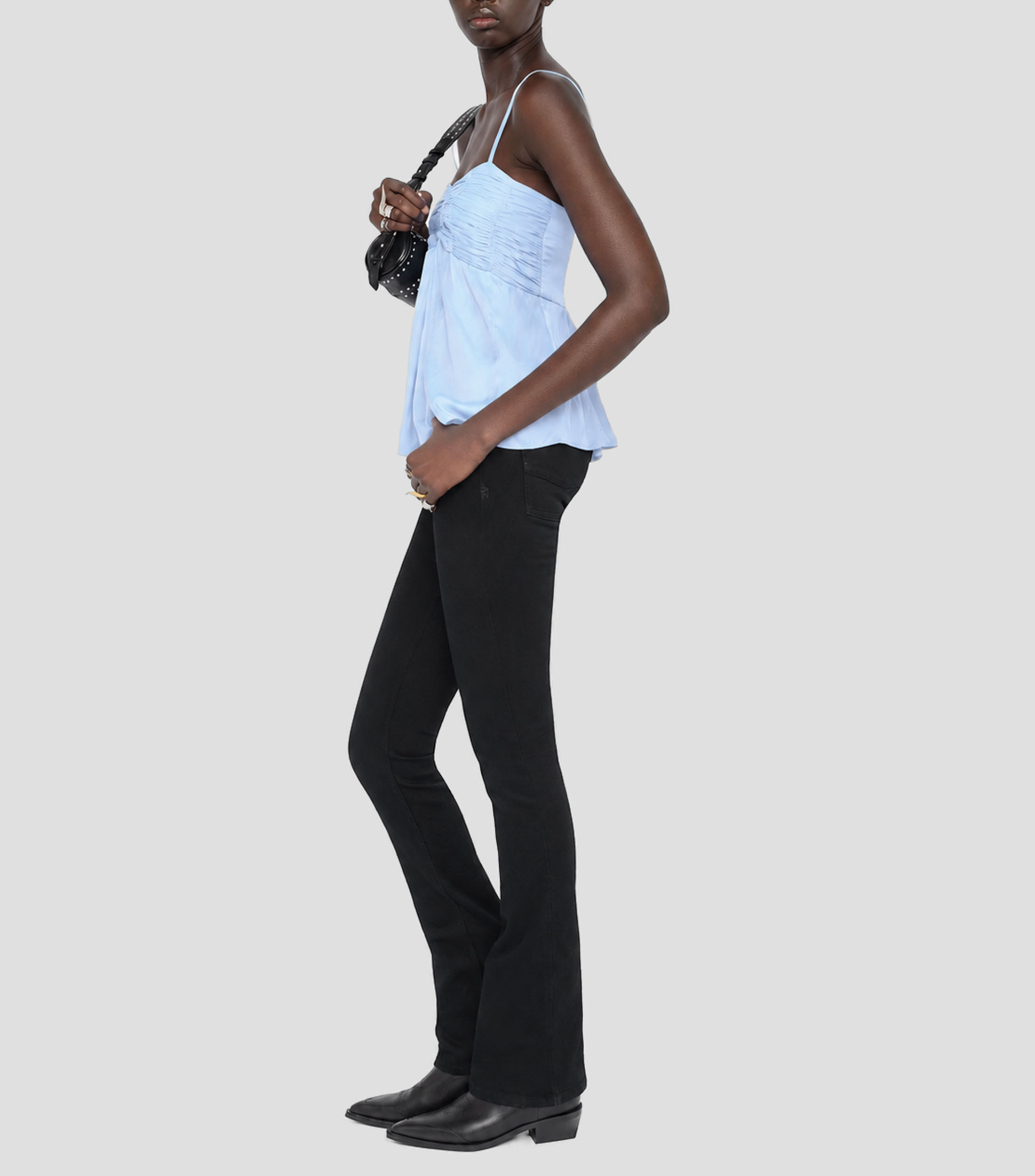 Blusa lisa sin mangas Mujer